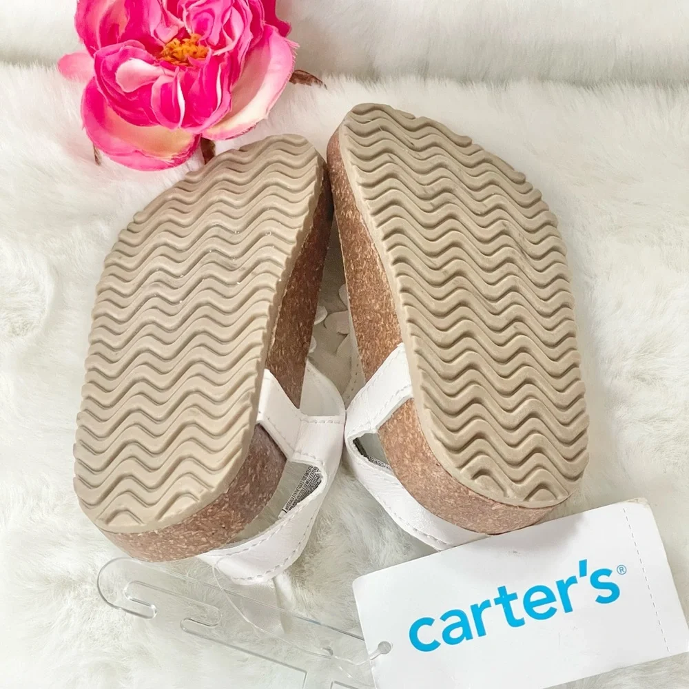 New with tags CARTER’S Toddler’s white Sandals with White Floral Design. Velcro